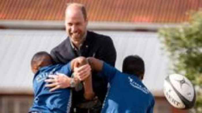 Prince William plays rugby with children in Cape Town