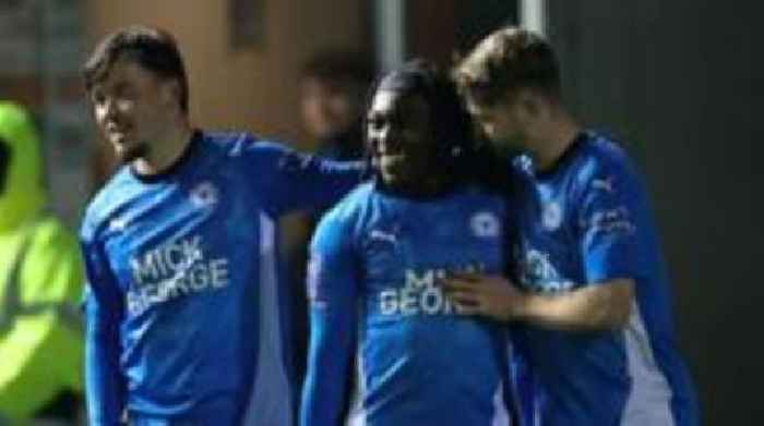 EFL Trophy: Holders Peterborough through to last 16