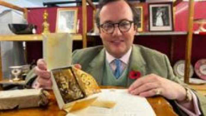 Slice of Queen's wedding cake sells for £2k