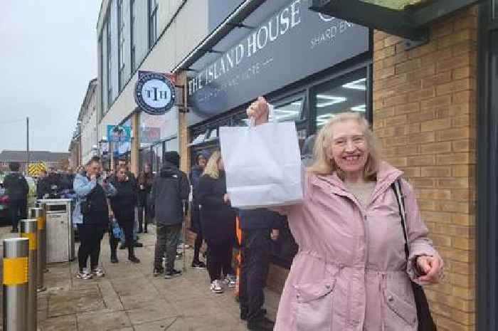 Large queues at new Birmingham chip shop as customers flood in holding one thing in their hands