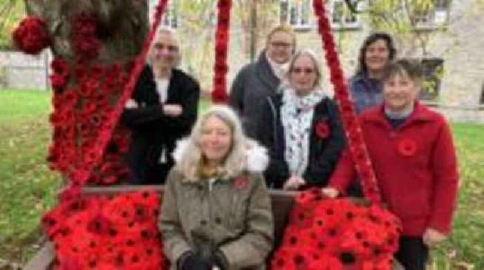 Knitted poppies adorn 'thankful' village's church