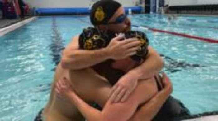 'Magic' moment as radio team complete charity swim