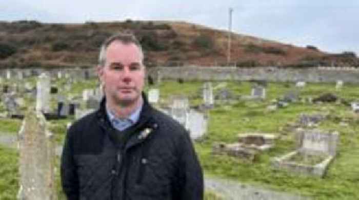 Man visiting war grave of every hometown soldier