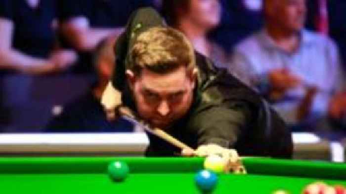 Jones beaten in last eight by defending champion