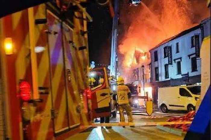 Huge fire rips through town centre building in Wales as homes evacuated