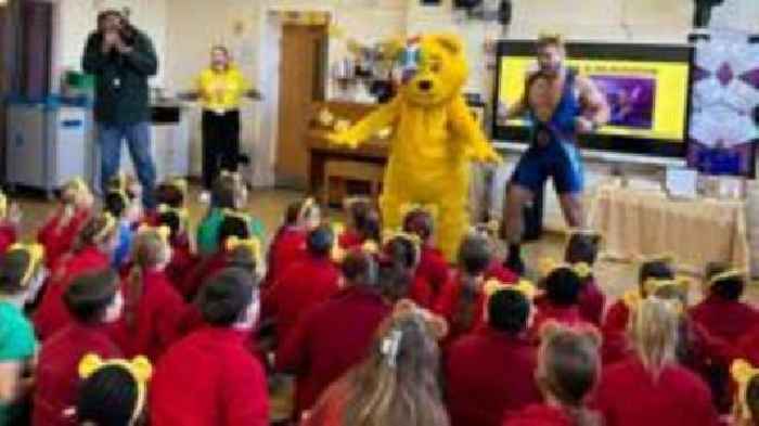 Gladiator drops in on pupils for Children in Need