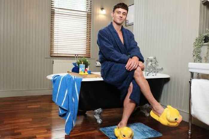 Tom Daley strips down to his swim trunks as he's unveiled as 'nice bath ambassador'