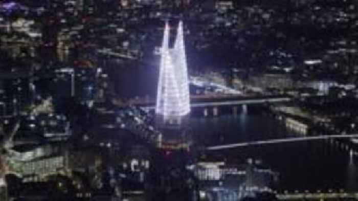 Choir sings at The Shard's Christmas lights display