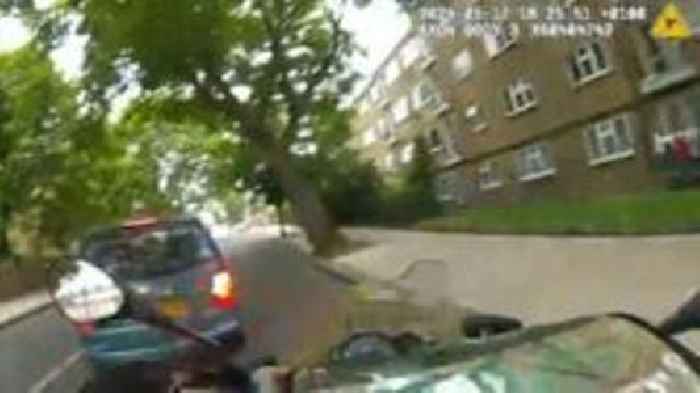 Watch: Met Police officer rammed off motorcycle