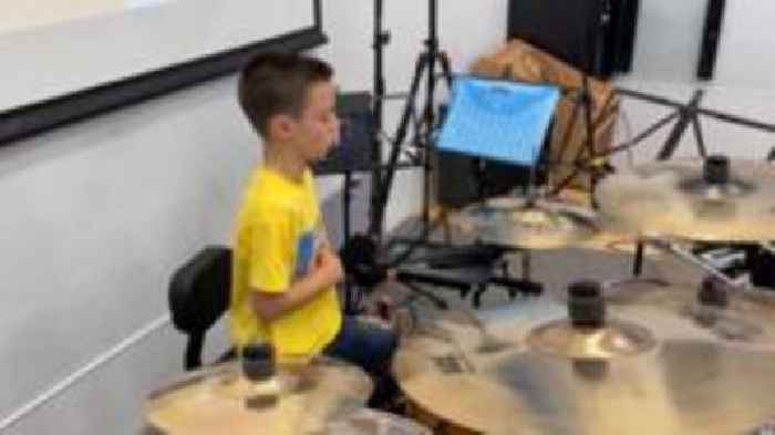 Boy performs 12-hour drumathon for charity