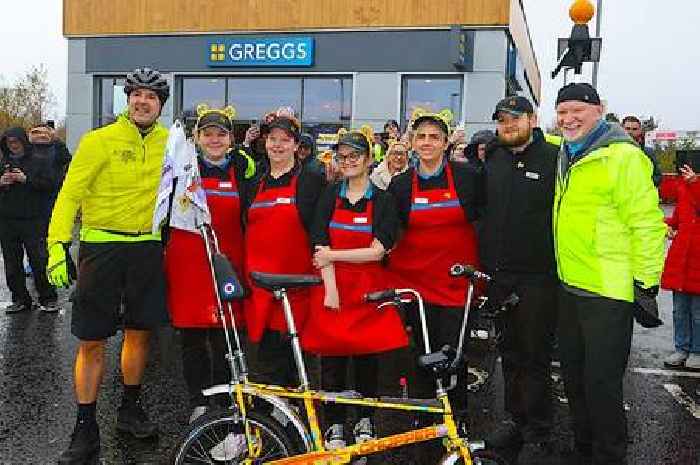 Paddy McGuinness tucks into a Greggs sausage roll in East Kilbride as he greets fans