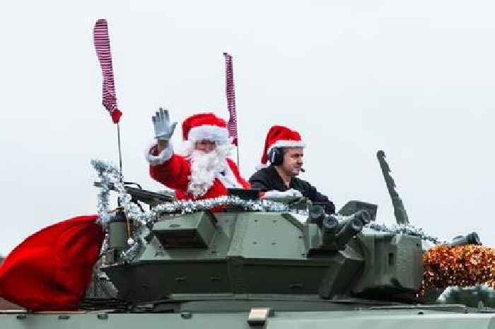 Santa arrives on a tank at the Tank Museum’s Dorset Christmas