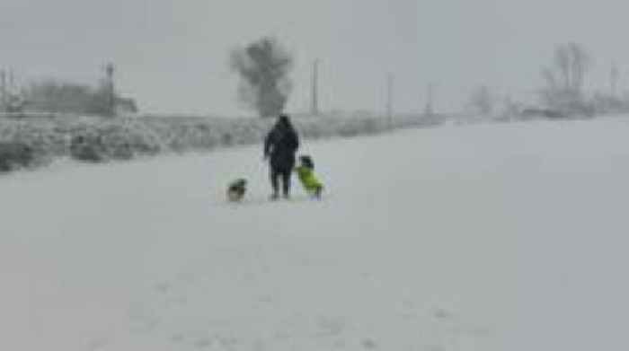 Snow and ice shut schools as Storm Bert looms