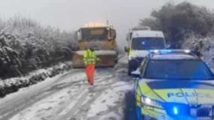 Schools and roads close as snowfall arrives