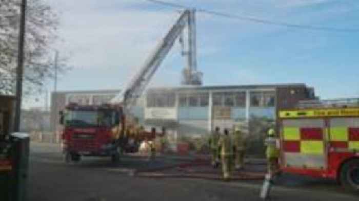 Firefighters tackle derelict warehouse blaze