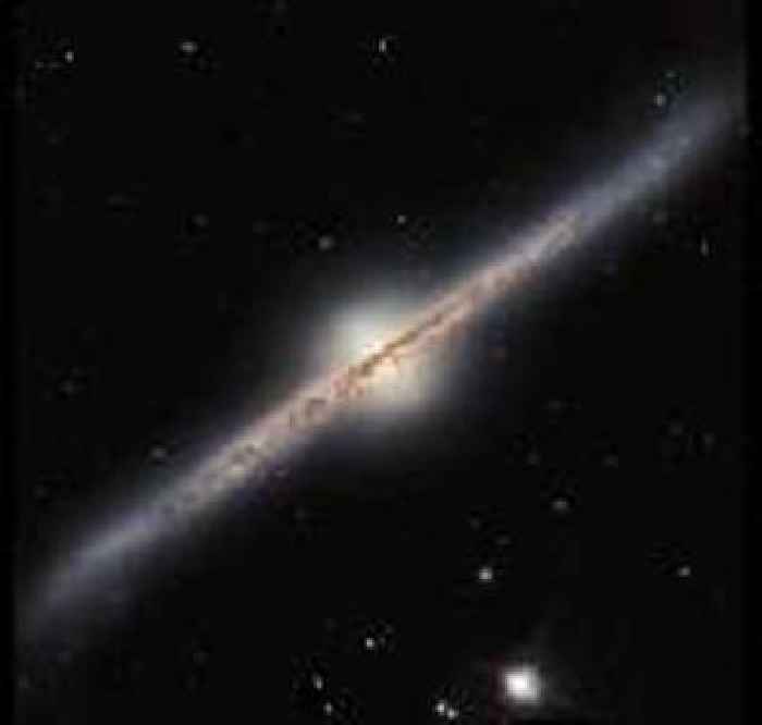 Hubble reveals edge-on spiral galaxy with unique structure