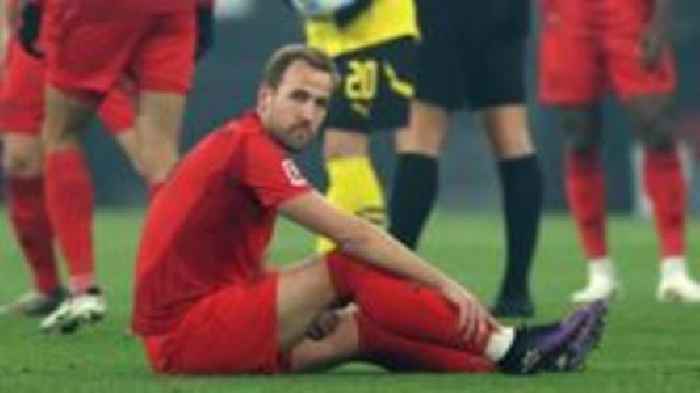 Kane injured as Bayern fight back to draw at Dortmund