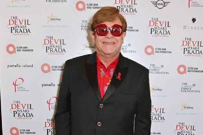 Elton John makes rare health admission as he's led off stage by David Furnish