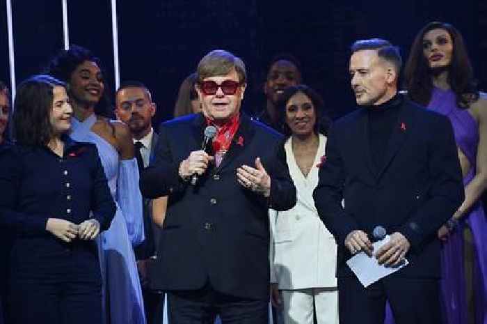 Elton John has to be led away from stage after losing eyesight