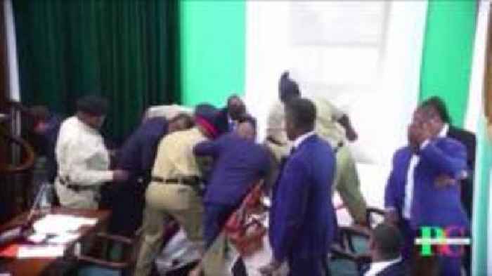 Moment Bahamas MP throws mace out parliament window