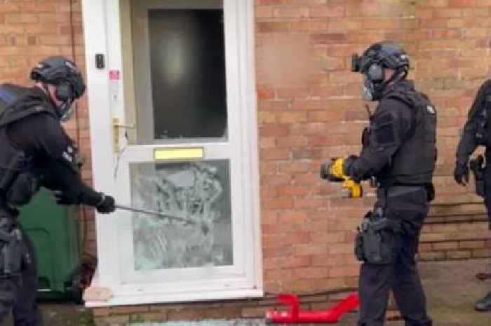 Police officers smash through door in Bristol during drug bust