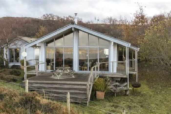 Inside spectacular Isle of Skye lodge for sale with loch and mountain views