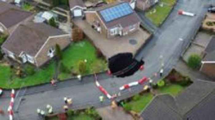 Families 'devastated' as sinkhole in street grows