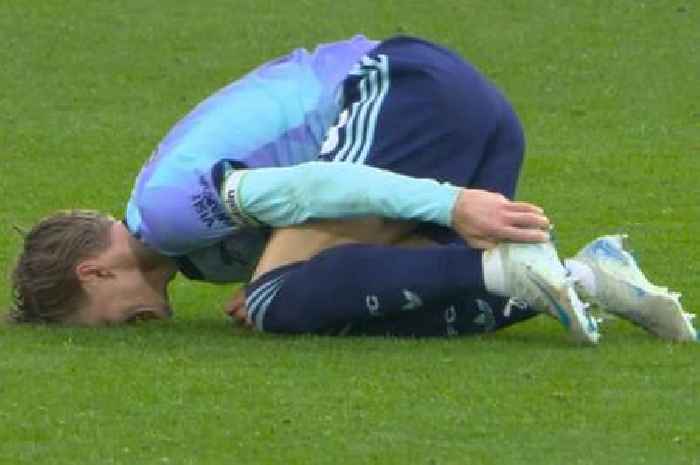 Martin Odegaard clutches ankle in agony as Arsenal fans fear star badly injured vs Fulham