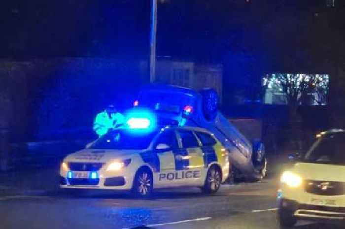 Horror crash sees car flip in Scots town as van driver flees scene