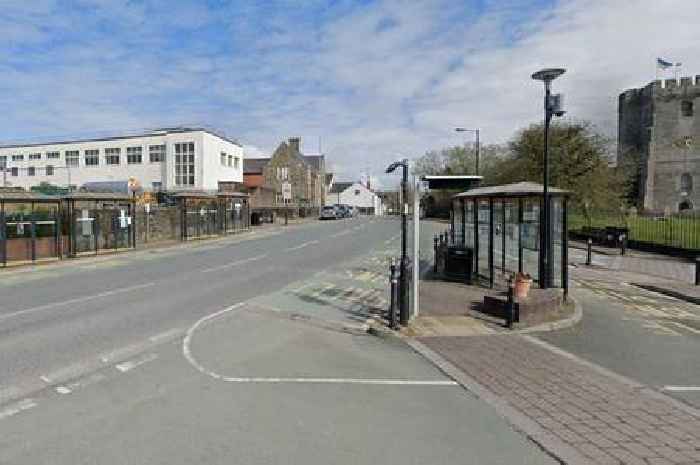 Woman taken to hospital after being hit by car in town centre