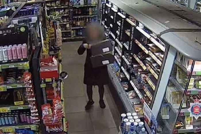 Moment brazen shoplifter raids Essex garage shop caught on CCTV