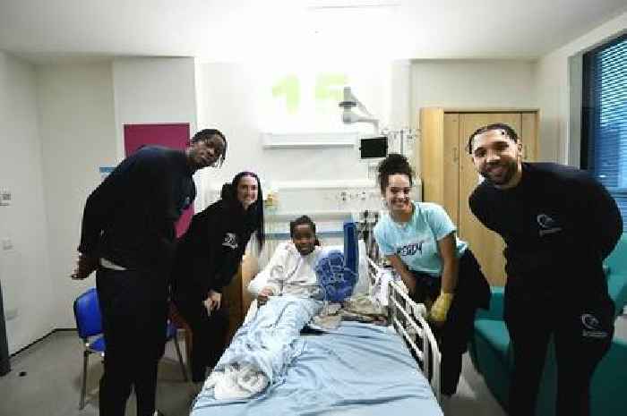 Basketball stars bring festive spirit to sick kids at Glasgow Children’s Hospital