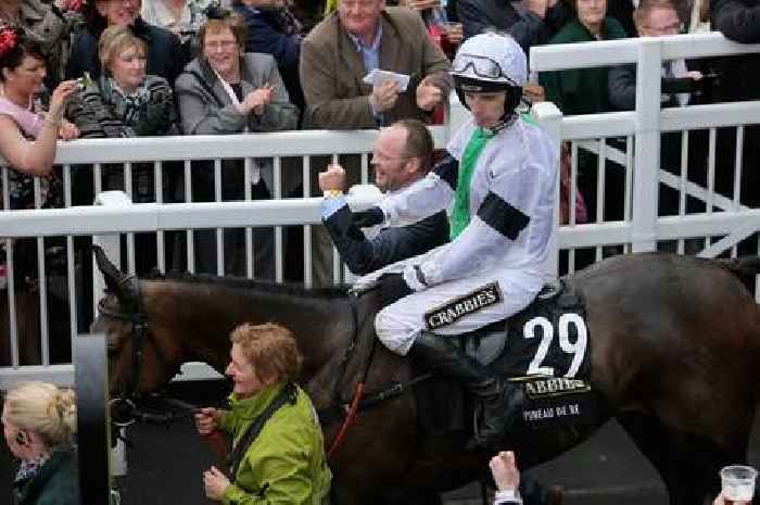 Grand National-winning jockey seriously injured as falling tree crushes car