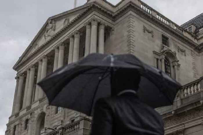 Bank of England holds interest rates and downgrades growth forecasts