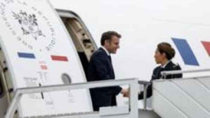 Macron lands in cyclone-hit Mayotte bringing food and health aid