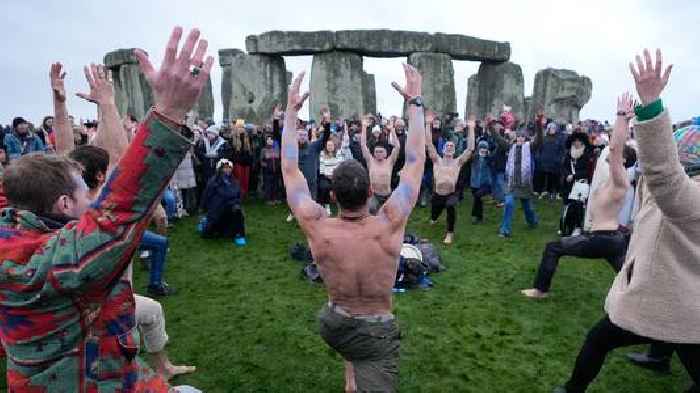 Thousands meet at Stonehenge to celebrate winter solstice