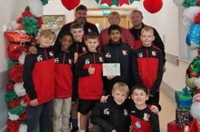 Gloucester under-11s football team deliver dozens of gifts to children in hospital