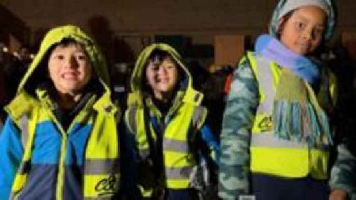 Volunteers bike through city to hand out donations