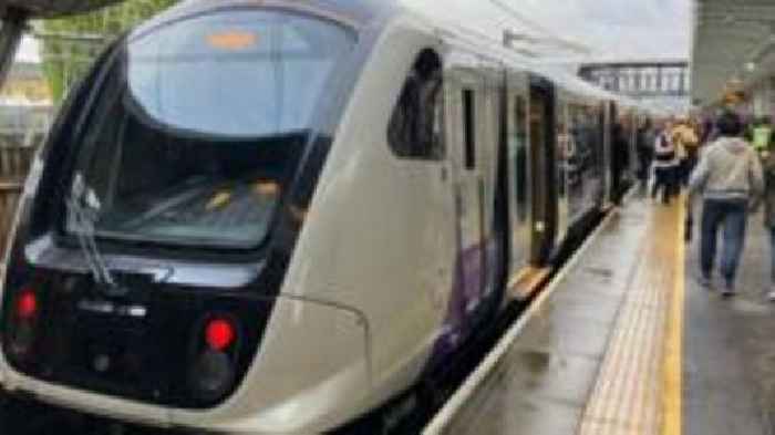 Person caught in train doors pulled along platform