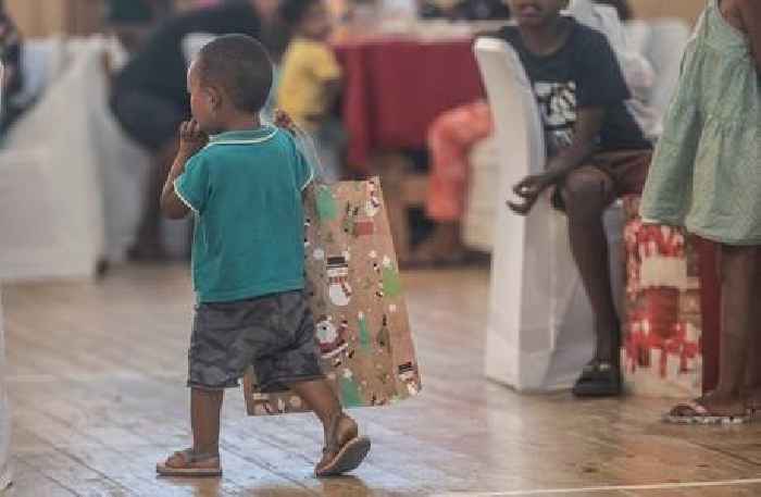 News24 | Christmas cheer: Cape Town foundation puts smiles on kids' faces with Santa shoe boxes, family lunch