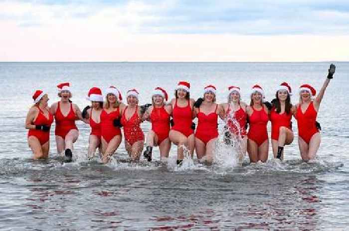 Brave Christmas dippers take icy plunge on Scots beach