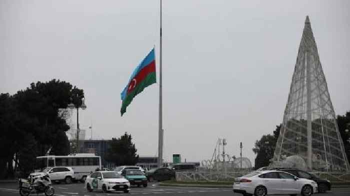 Azerbaijan observes day of mourning for air crash victims as speculation mount about its cause