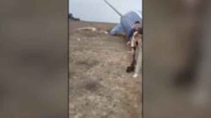 Footage shows survivors walking from crashed Azerbaijani plane