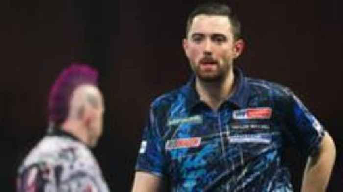 Defending champion Luke Humphries knocked out of World Darts Championship