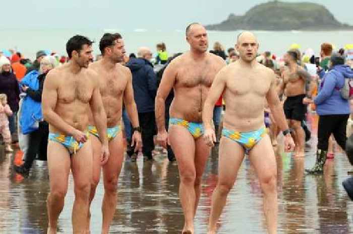 The best pictures from the 2025 Saundersfoot New Year's Day Swim as thousands brave the water