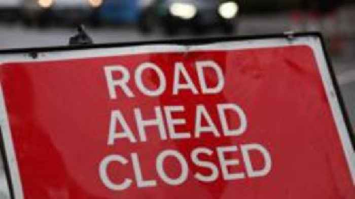 Road closed after electrical house fire