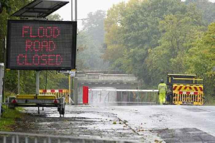 Urgent Surrey flood warnings put in place as residents told to 'act now' after heavy rain