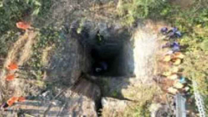 India rescuers race to save men stuck in flooded rat-hole mine