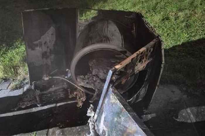 What was left of a tumble dryer after it caught fire in a house