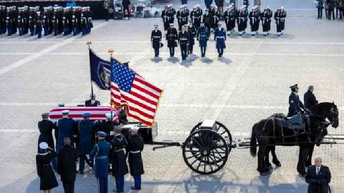 In photos: Mourners pay respects to Jimmy Carter